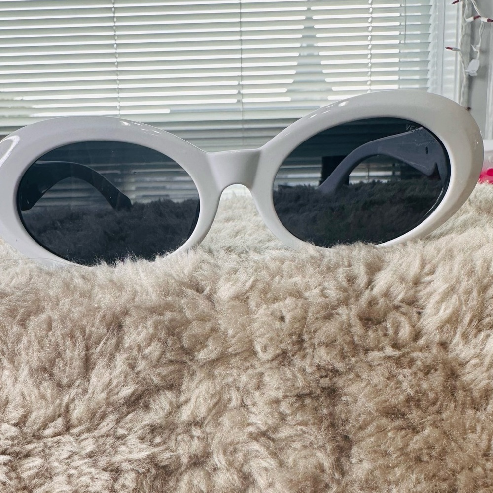 White Oval Sunglasses with Black Lenses